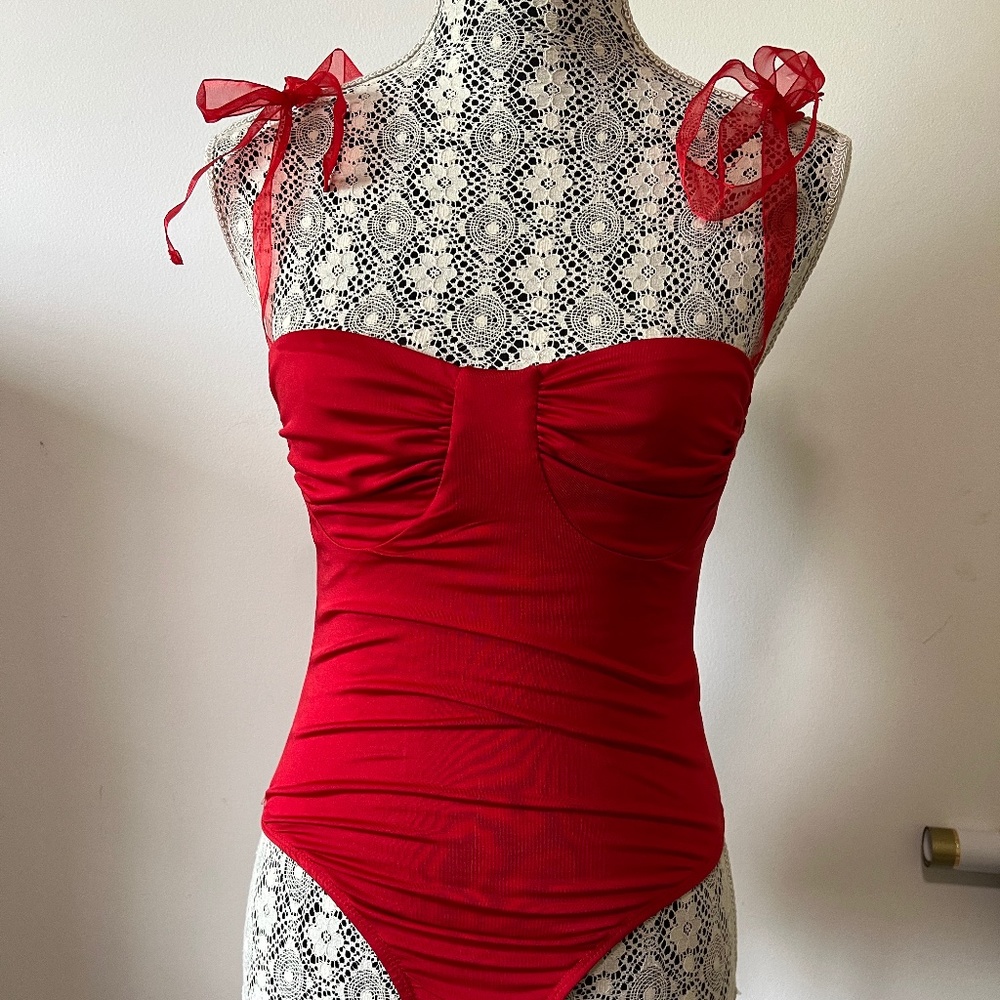 red bodysuit